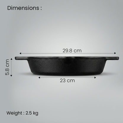 A black cast iron skillet with handle dimensions labeled on a light gray background, with text showing width measurements of 29.8 cm and 23 cm, and height of 5.